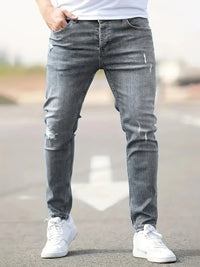 Men's Slim Fit Tapered Leg Distressed Denim Jeans with Ripped Knee Detail and Faded Wash