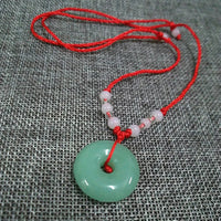 Graceful Jade Disc Pendant