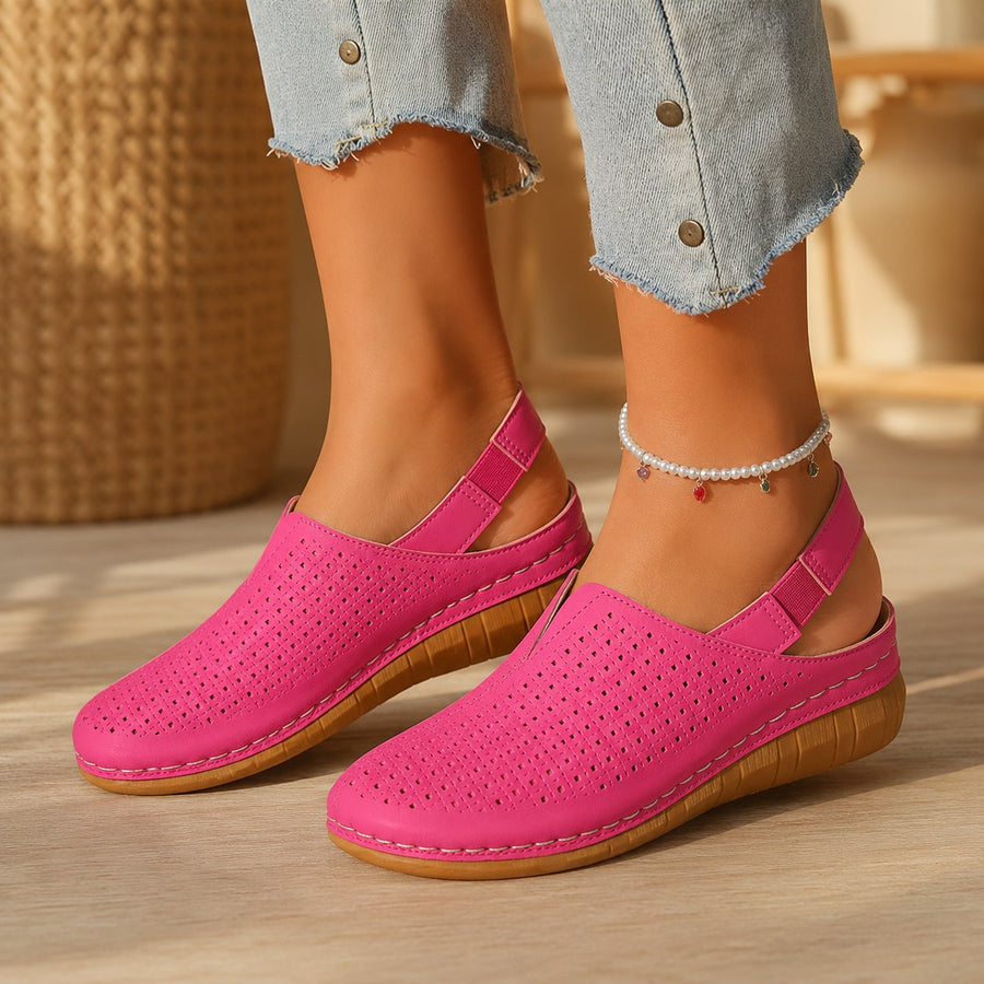 Halvine Women's Perforated Wedge Slingback Sandal in Pink