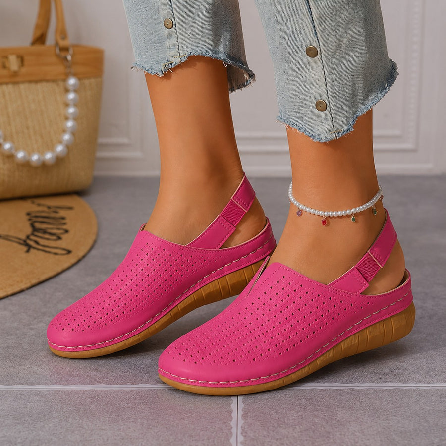 Halvine Women's Perforated Wedge Slingback Sandal in Pink