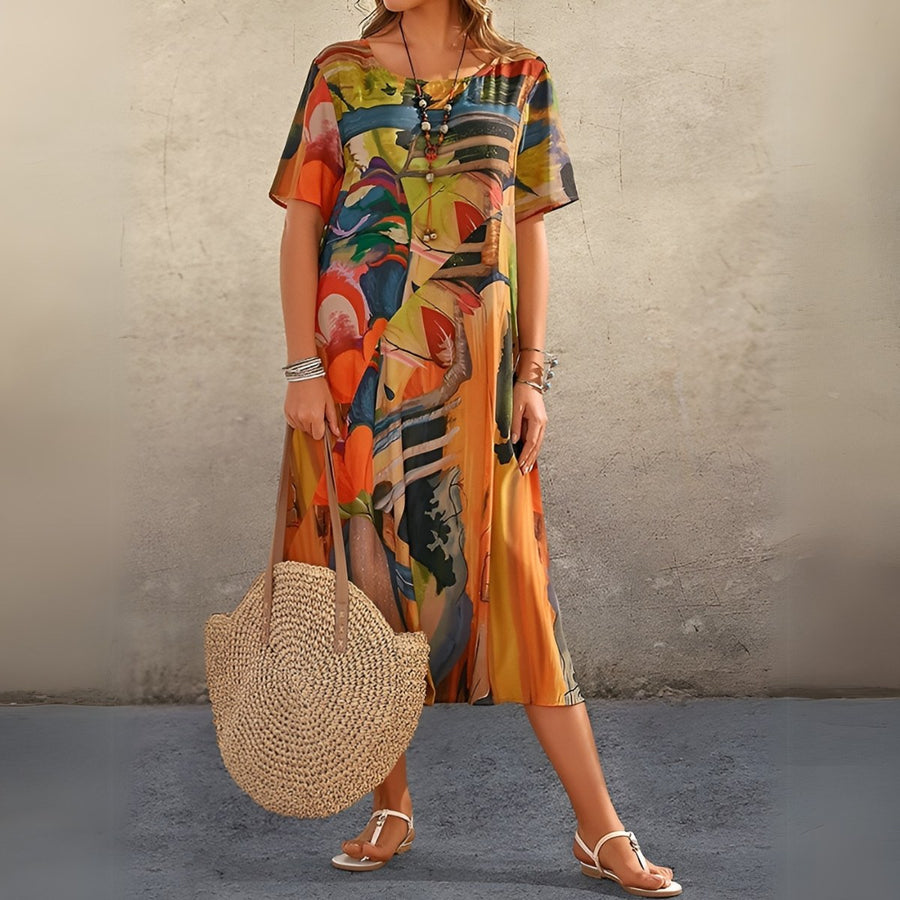 Joelle Flowing and Elegant Floral Dress in Orange