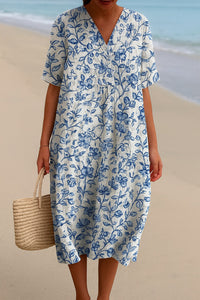 Madeline™ Ivory Dress Adorned with Porcelain Blue Floral Accents in Blue