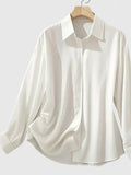 Melvaya | Elegant Hidden-Button Collared Curved-Hem Top