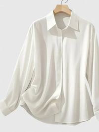 Melvaya | Elegant Hidden-Button Collared Curved-Hem Top