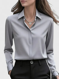 Melvaya | Elegant Hidden-Button Collared Curved-Hem Top