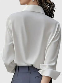 Melvaya | Elegant Hidden-Button Collared Curved-Hem Top