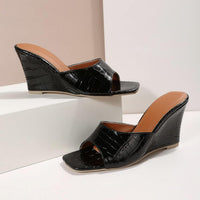 Monroe Faux Snake Leather Wedges in Black