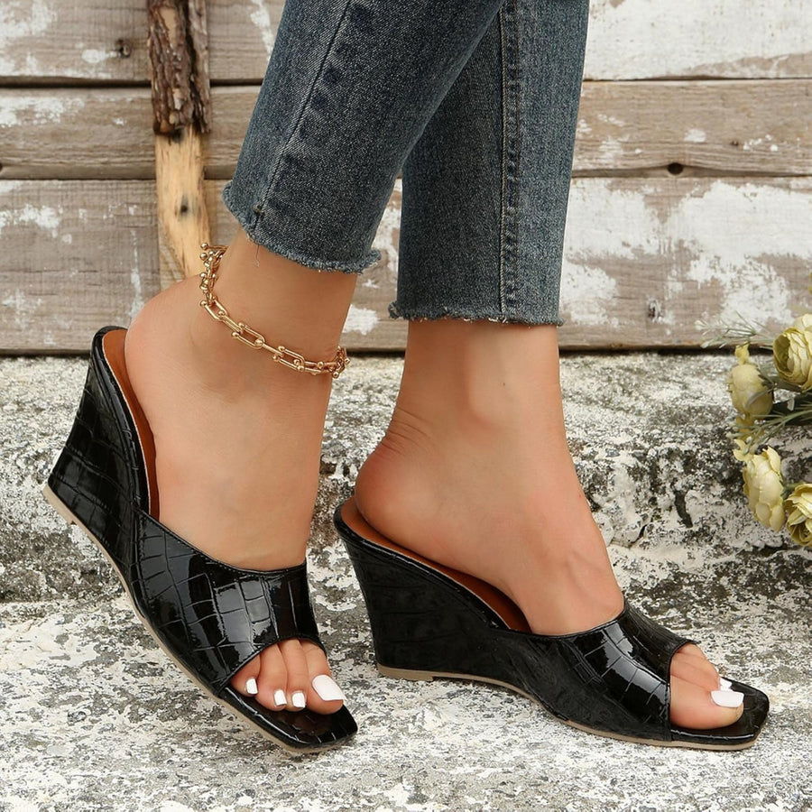 Monroe Faux Snake Leather Wedges in Black