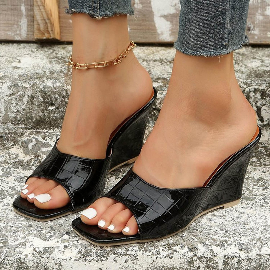 Monroe Faux Snake Leather Wedges in Black