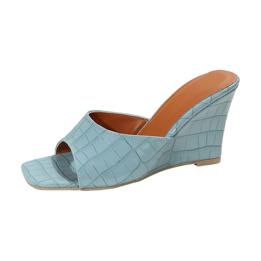 Monroe Faux Snake Leather Wedges in Black