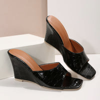 Monroe Faux Snake Leather Wedges in Black