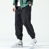 Otto Corduroy Trousers in Black