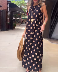 Roxane™ Maxi dress with a slit and polka dots in Black