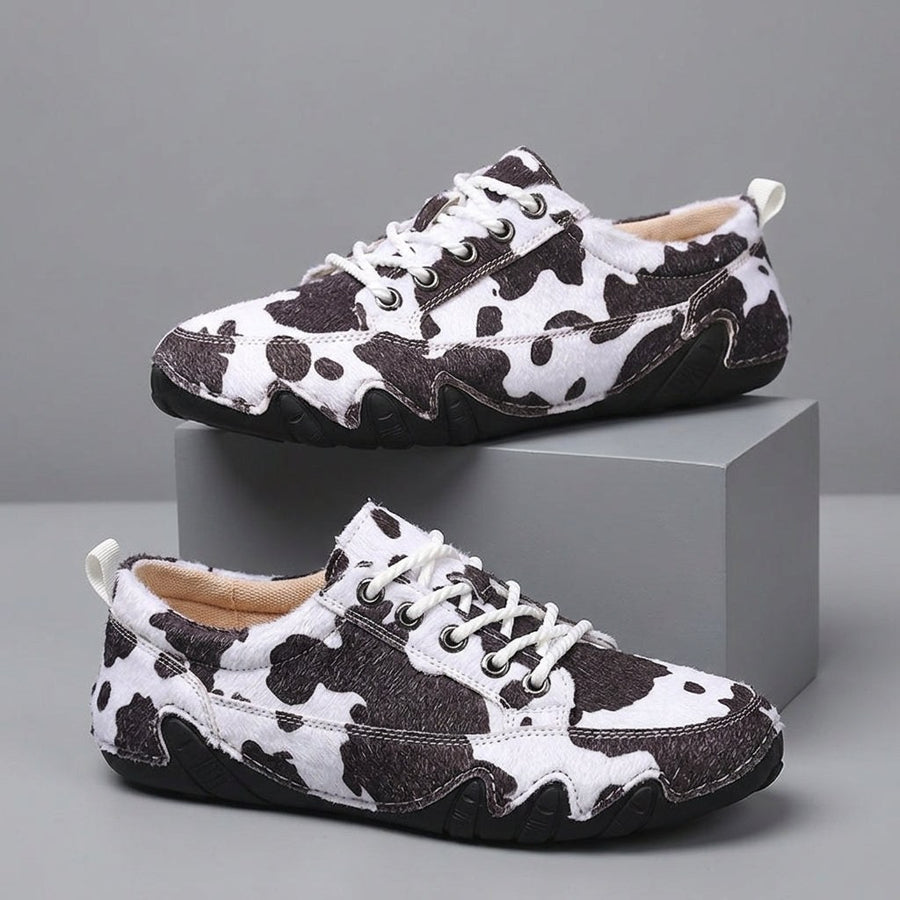Sadie Cow Print Sneaker in Black Cow