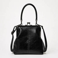 Vashara Women's Vintage Kiss Lock Crossbody Bag in Black