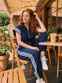 Vashti Women's Zip Front Stripe Panel Jumpsuit in Blue