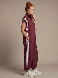 Vashti Women's Zip Front Stripe Panel Jumpsuit in Red