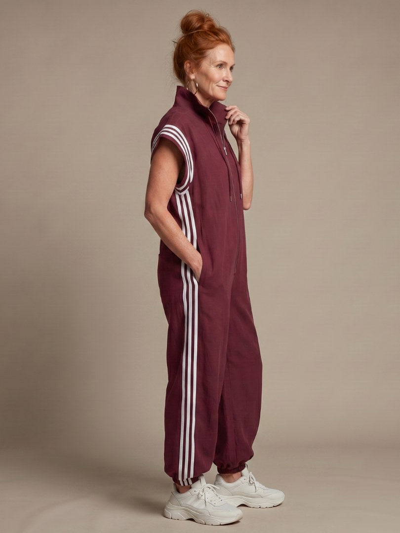 Vashti Women's Zip Front Stripe Panel Jumpsuit in Red