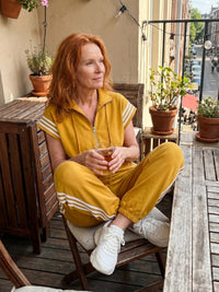 Vashti Women's Zip Front Stripe Panel Jumpsuit in Yellow