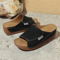 Willa Wedge Mules in Black